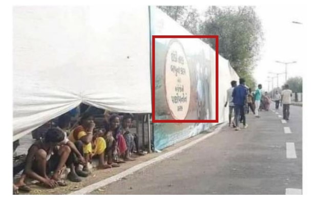 Ahmedabad slums covered in white cloth
