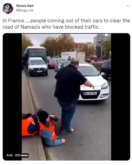 A viral video showing citizens evicting climate-change activists for obstructing traffic on a Paris road is being falsely claimed as an incident where motorists are dragging away people offering Namaz in the middle of the road.